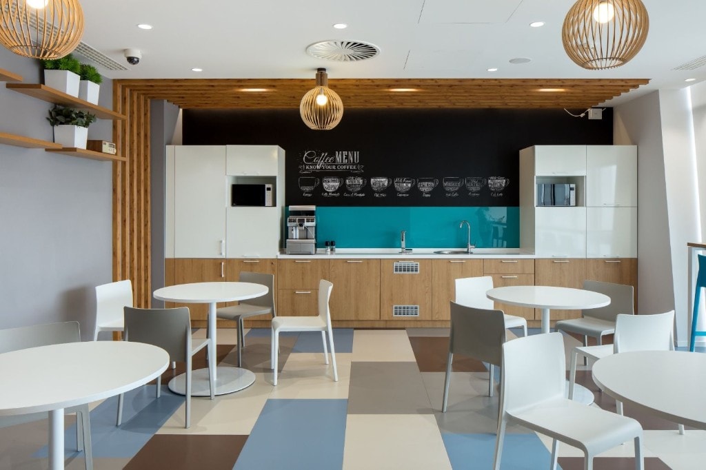 Office pantry with coffee bar and dining area