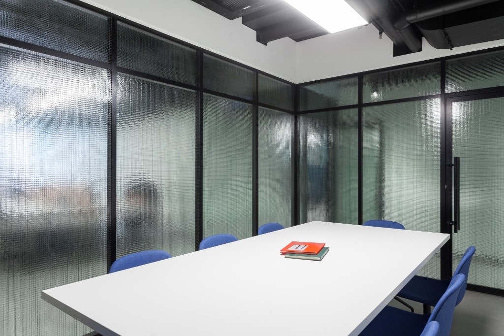 Glass-partitioned conference room